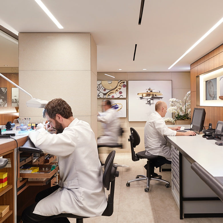 The Rolex service procedure Watchmakers at work in a Rolex service workshop