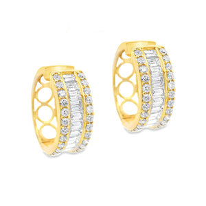 These beautiful 18k yellow gold diamond hoops feature 29 baguette c...