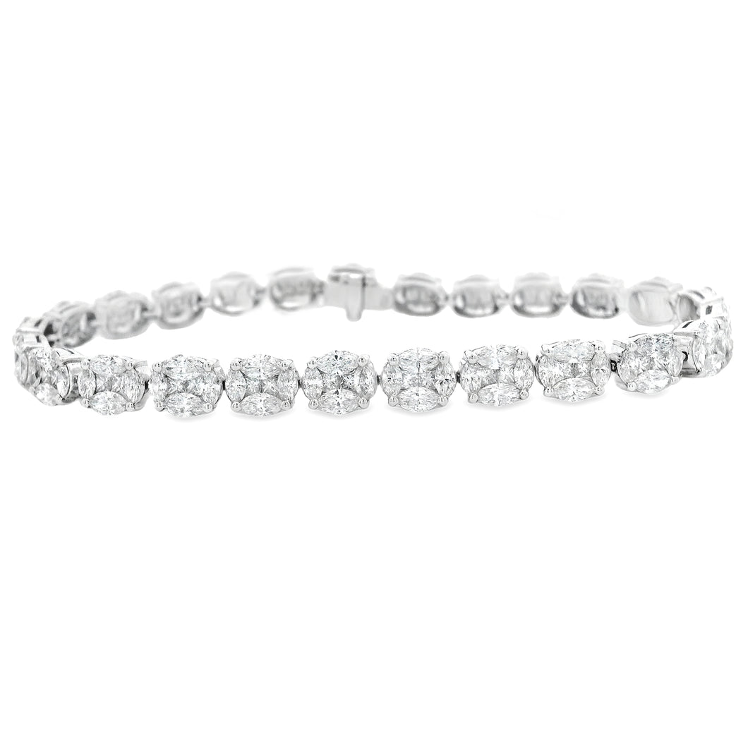 This beautiful 18k white gold diamond bracelet features marquise cu...