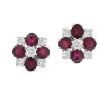 These gorgeous 18k white gold earrings feature oval cut rubies and ...