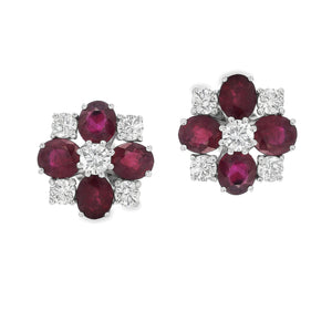 These gorgeous 18k white gold earrings feature oval cut rubies and ...