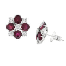 These gorgeous 18k white gold earrings feature oval cut rubies and ...