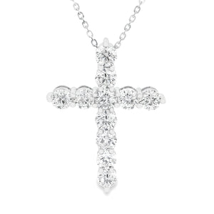 This large 18k white gold necklace features a cross pendant featuri...