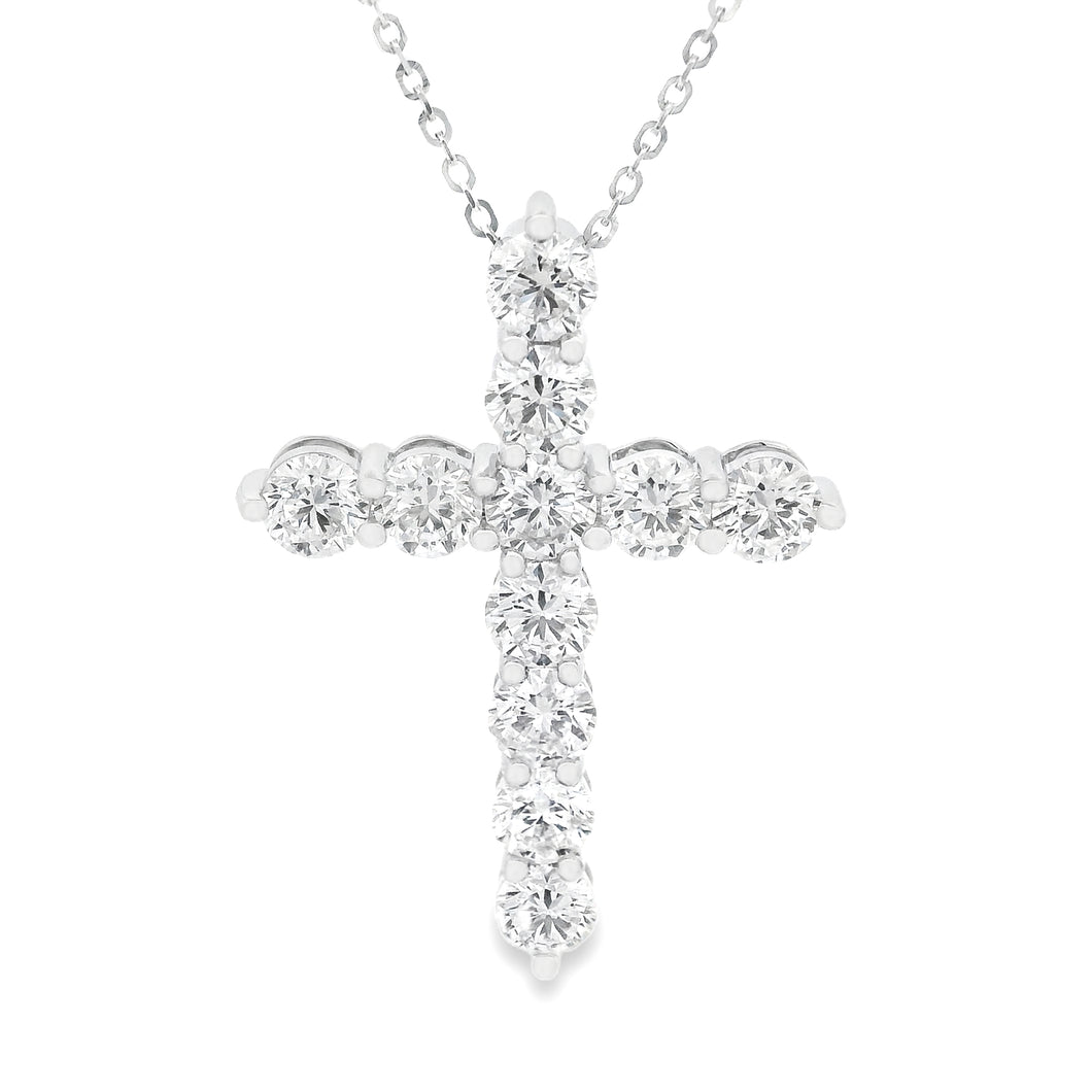 This large 18k white gold necklace features a cross pendant featuri...