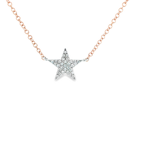 This dainty 14k rose gold necklace features a pave-set diamond star...