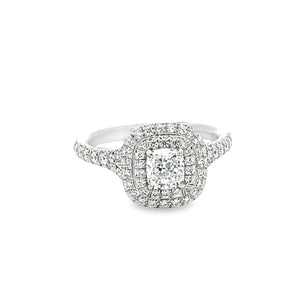This platinum engagement ring by Tiffany & Co features a cushio...