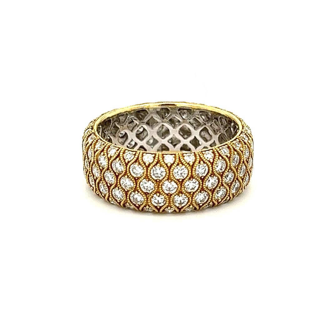 This beautiful and unique 18k yellow gold diamond band features pav...