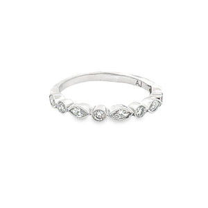 This 18k white gold diamond band by A. Jaffe features alternating m...