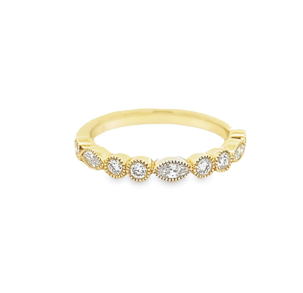 This 18k yellow gold diamond band by A. Jaffe features marquise and...