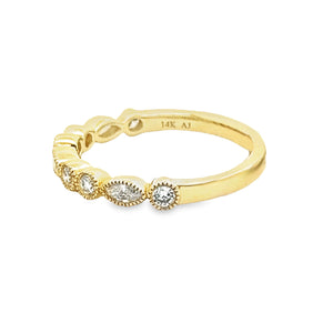 This 18k yellow gold diamond band by A. Jaffe features marquise and...