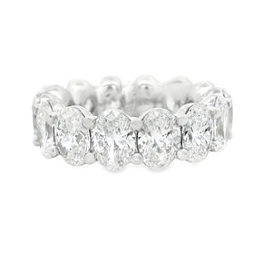 This stunning 18k white gold diamond eternity band features 14 oval...