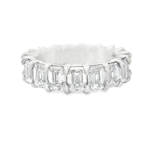 This gorgeous platinum diamond eternity band features 18 emerald cu...