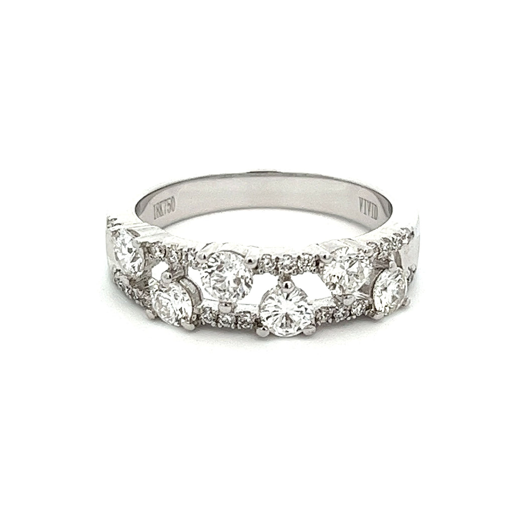 This 18k white gold diamond band features 24 round brilliant cut di...