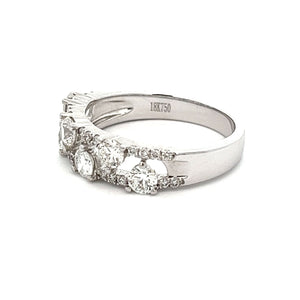 This 18k white gold diamond band features 24 round brilliant cut di...