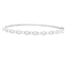 This easy to stack and style bangle features bezel-set round brilli...