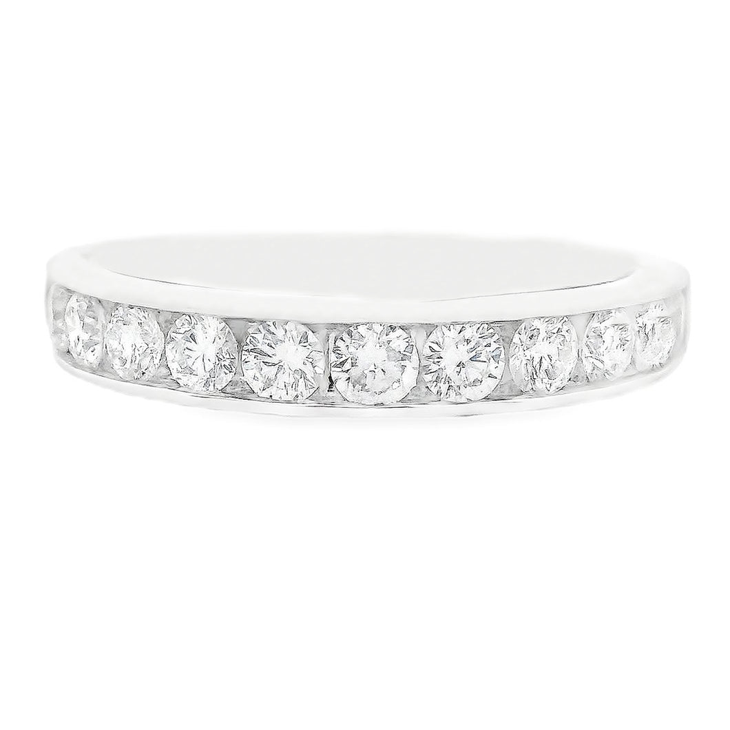 This beautiful 14k white gold diamond band features channel-set rou...