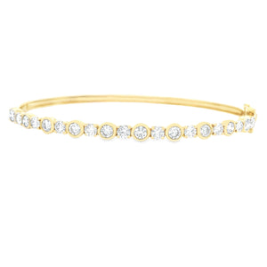 This easy to stack and style bangle features bezel-set round brilli...