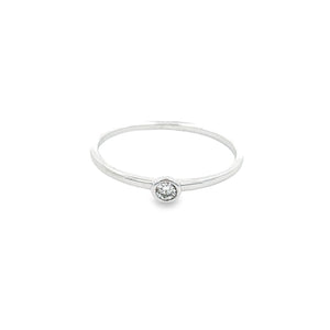  14k white gold ring with a round brilliant cut bezel-set diamond w...