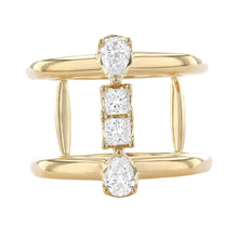 This gorgeous 18k yellow gold ring features 2 princess cut diamonds...