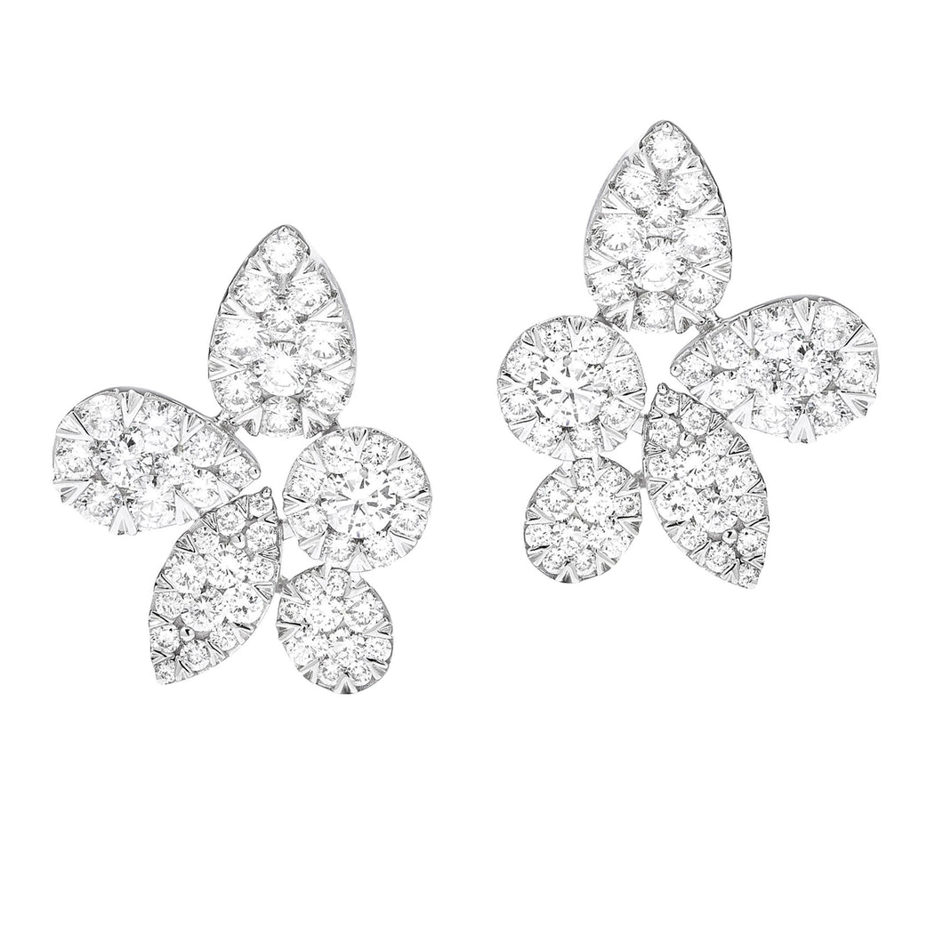 These gorgeous 14k white gold diamond leaf stud earrings feature ro...
