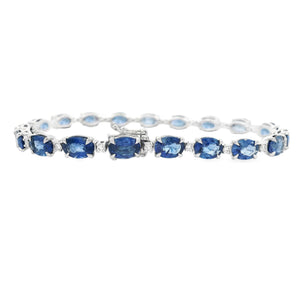 This beautiful 18k white gold bracelet features alternating sapphir...