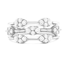 This gorgeous 18k white gold ring features 3 rows of round brillian...