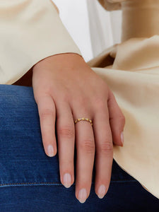 A ring dedicated to Nanis' iconic hand-engraved 18kt gold boules. B...