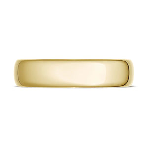 A classic rounded wedding band with a high polish finish. The inter...
