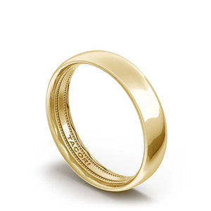 A classic rounded wedding band with a high polish finish. The inter...