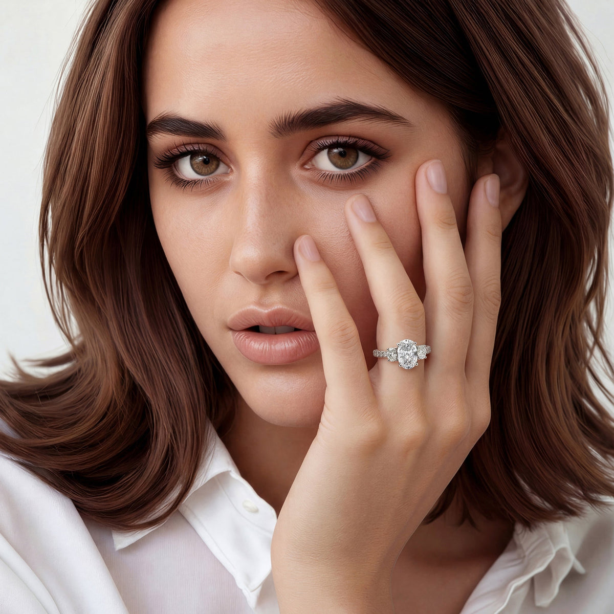 Model wearing a Verragio three stone diamond engagement ring