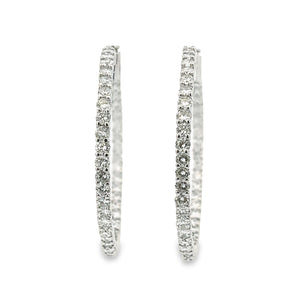 These beautiful diamond hoops feature 84 round brilliant cut diamon...