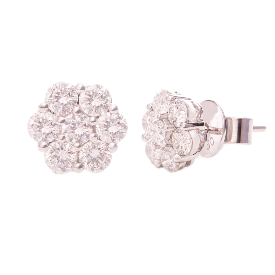 These beautiful 14k white gold stud earrings feature round brillian...