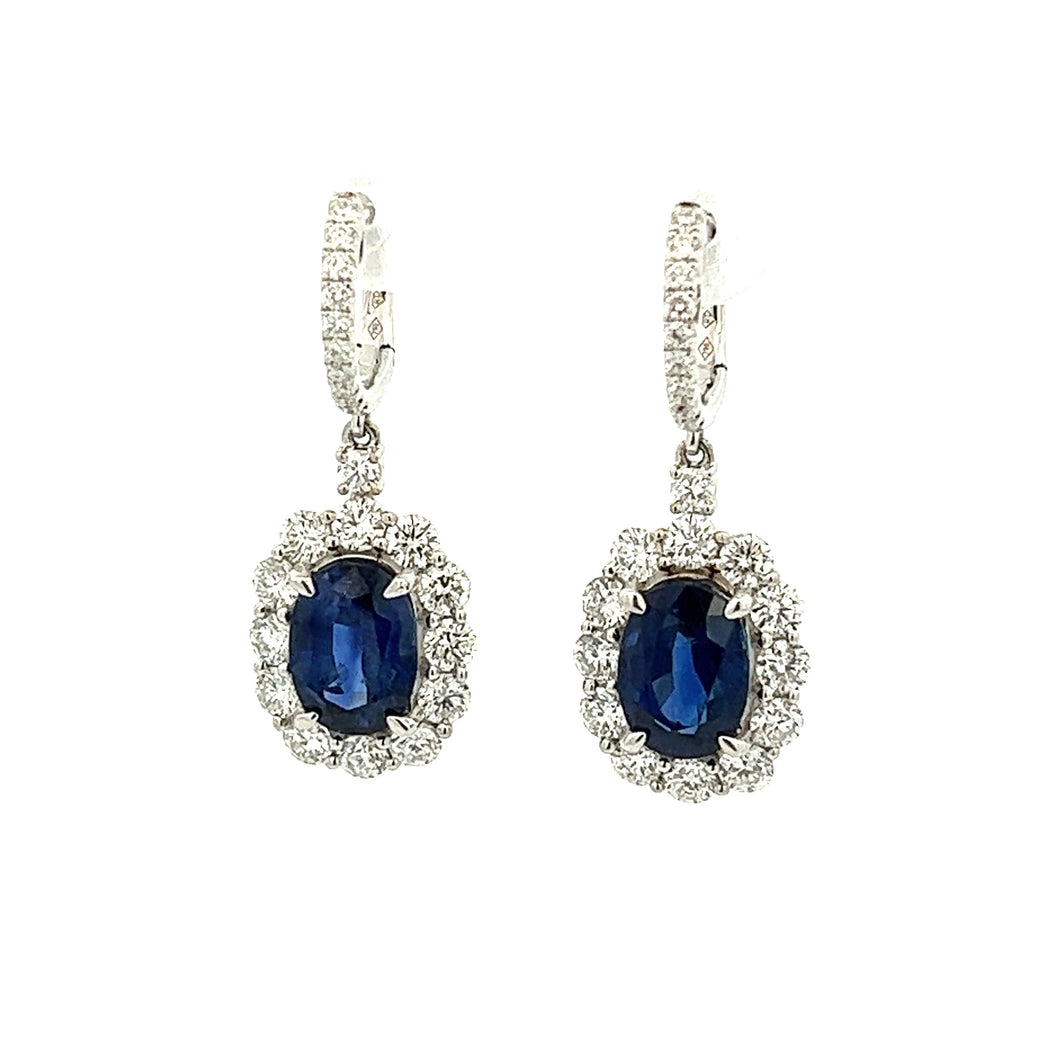 These beautiful 18k white gold drop earrings feature 46 round brill...