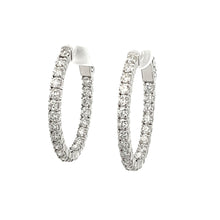 These beautiful 18k white gold diamond hoop earrings feature 42 rou...