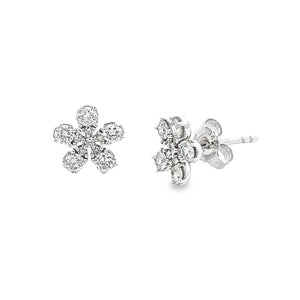 Dainty 14k white gold stud earrings feature pear shaped diamonds as...