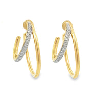 14k yellow gold hoop earrings feature diamonds totaling approx. .26...