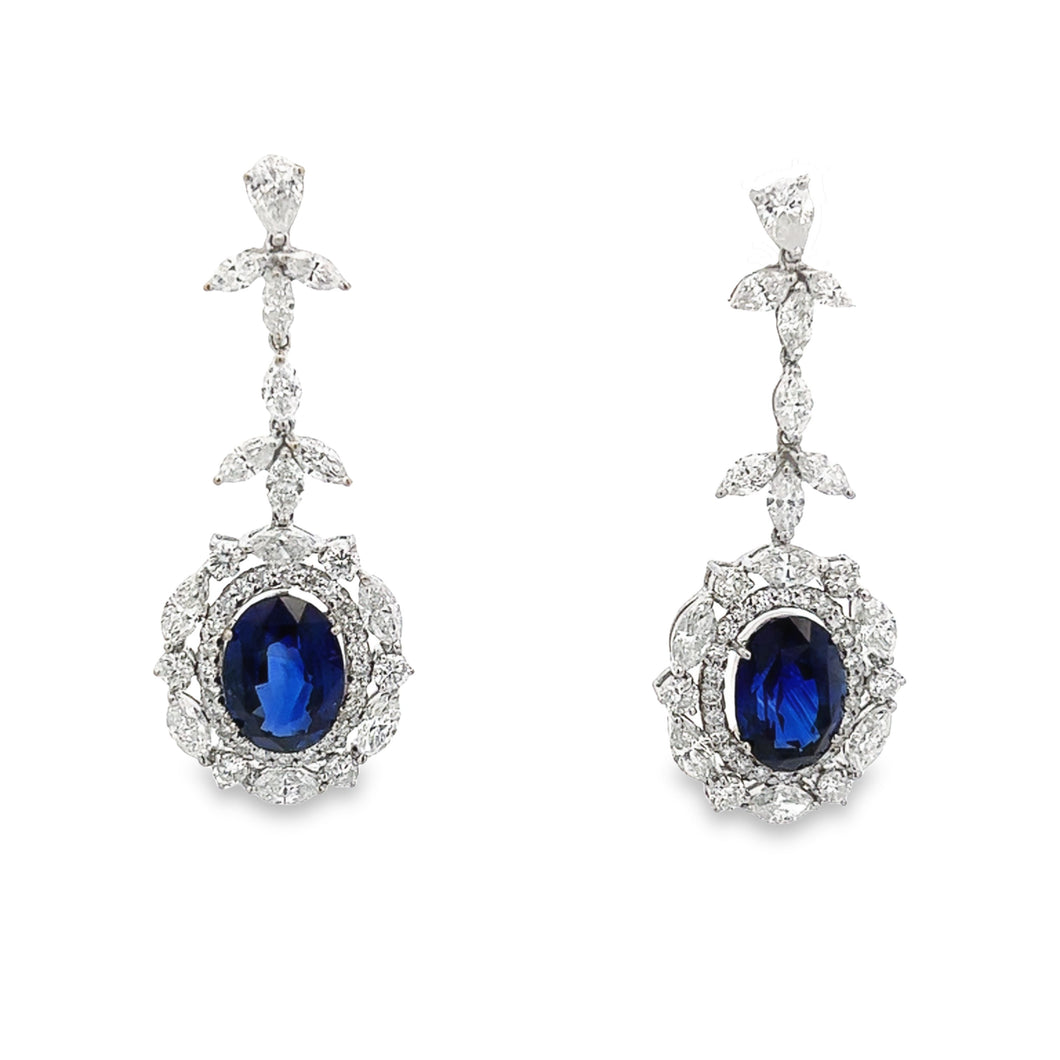 These 18k white gold drop earrings feature 2 stunning Ceylon sapphi...