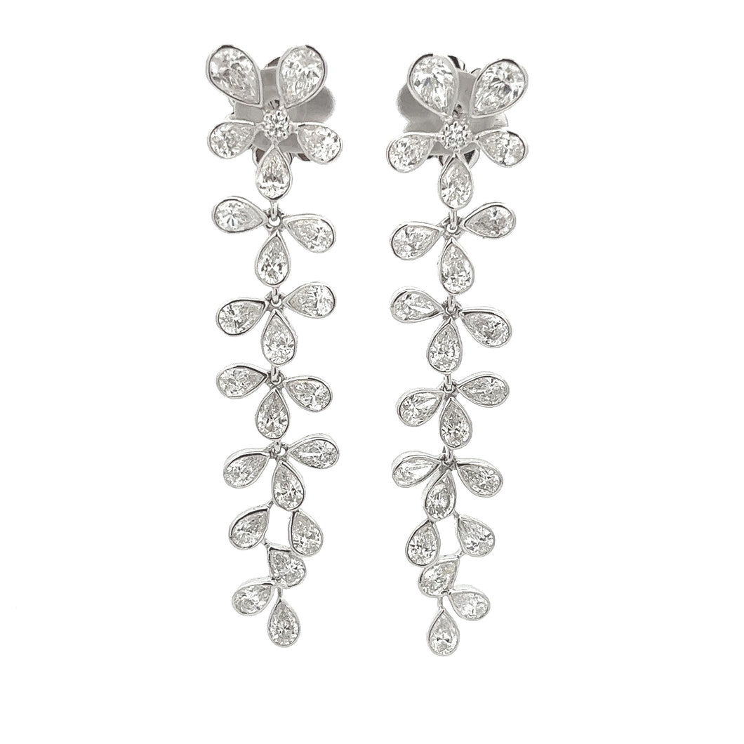 These gorgeous diamond flower drop earrings are a sophisticated way...
