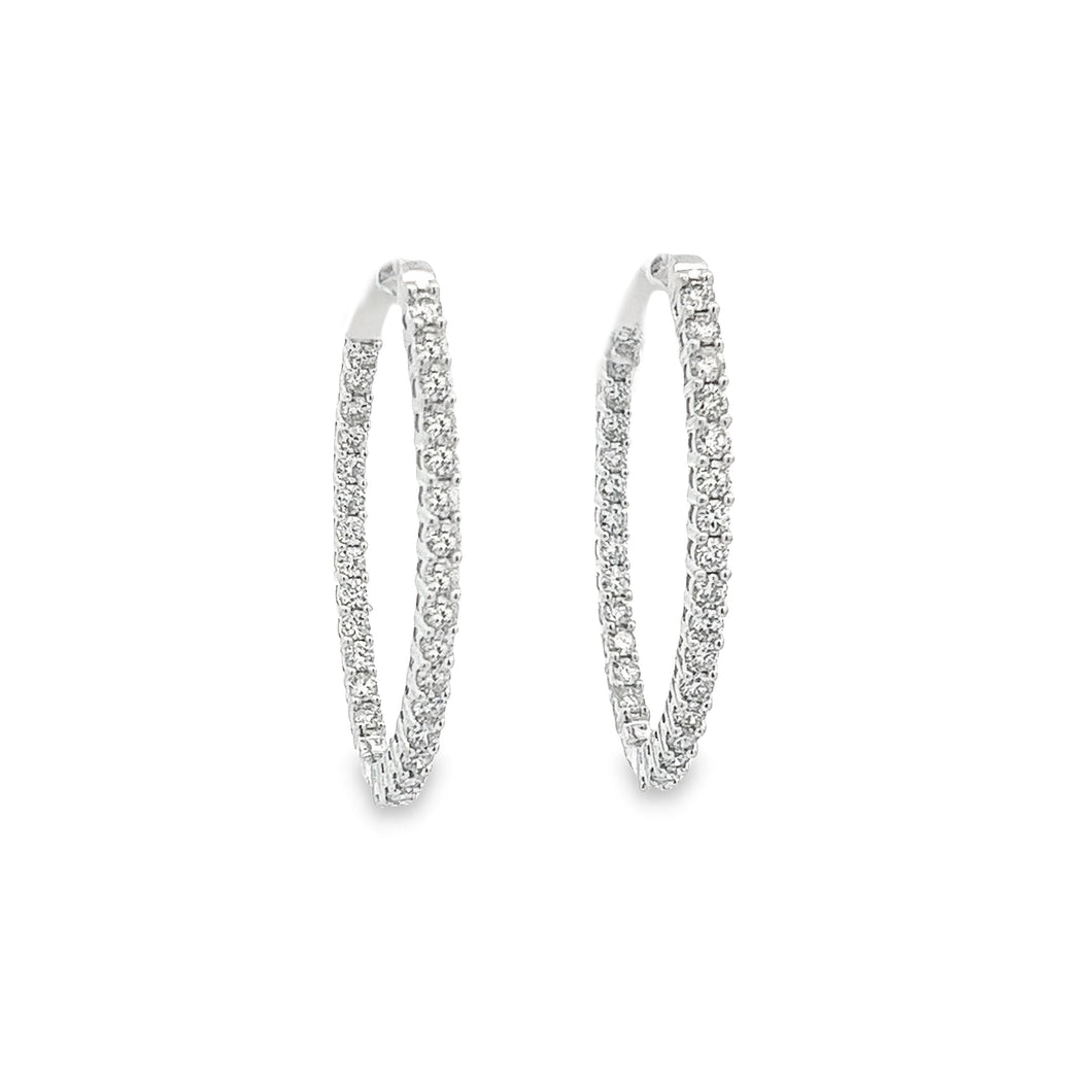 These beautiful diamond oval hoop earrings feature round brilliant ...