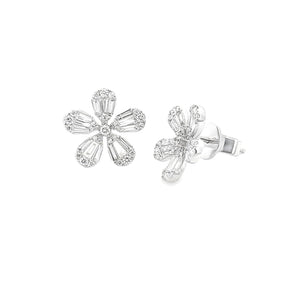 These 18k white gold diamond studs feature baguette and round brill...