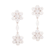These elegant 18k white gold drop earrings feature 28 round brillia...