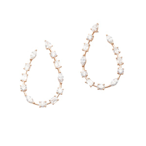 These beautiful 18k rose gold diamond hoop earrings feature various...