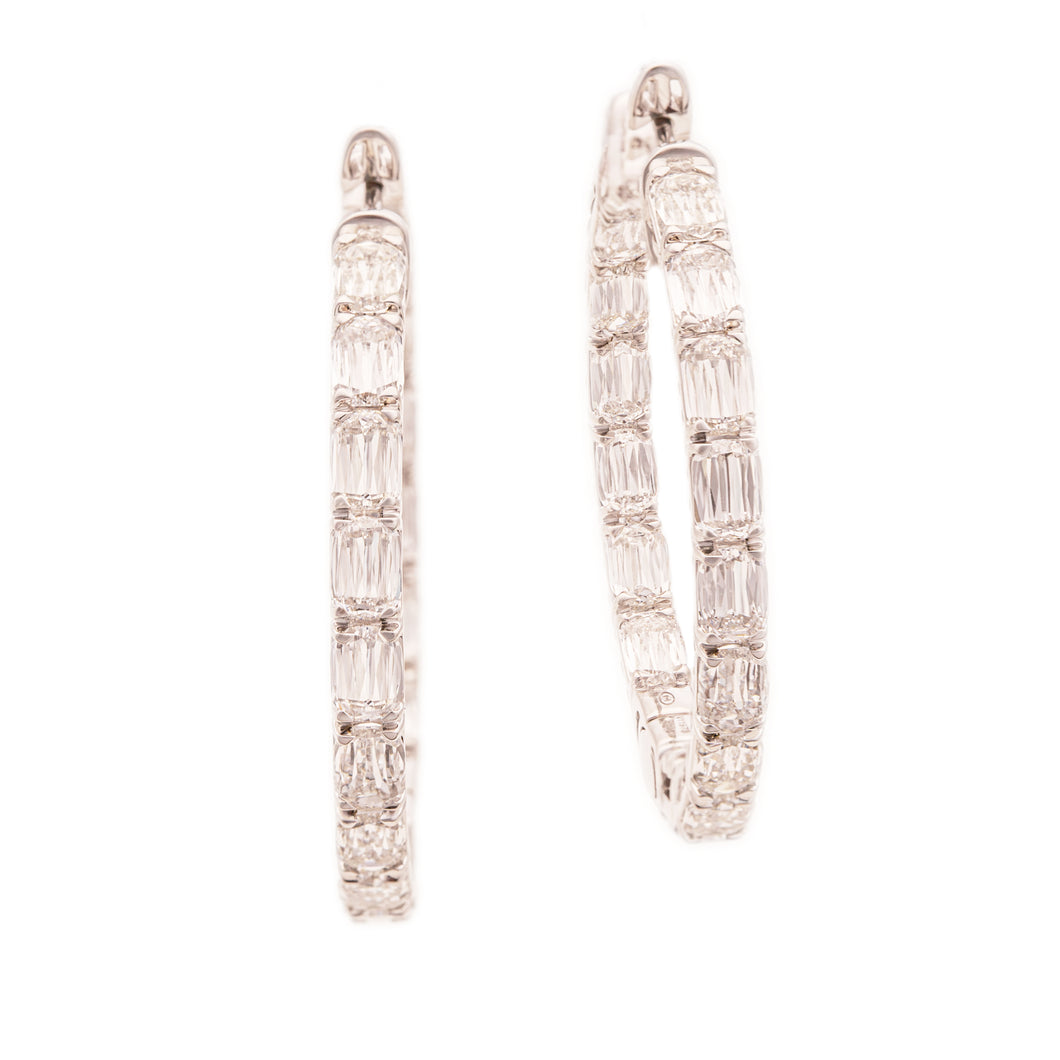 These beautiful 18k white gold diamond earrings from Christopher De...