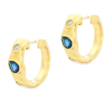 These dainty 14k yellow gold earrings feature 2 pear shaped sapphir...