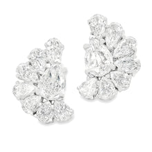 These beautiful 14k white gold diamond earrings feature 16 pear sha...