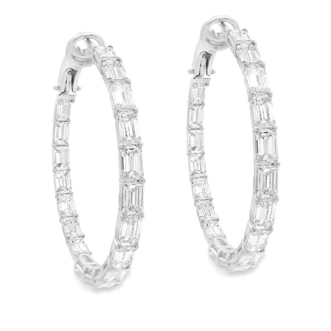 These beautiful diamond hoops feature 38 emerald cut diamonds total...