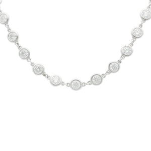 This stunning 18k white gold diamond by the yard necklace features ...