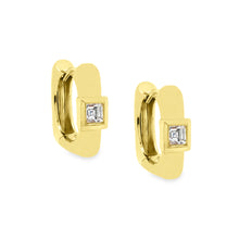 These beautiful 18k yellow gold huggy earrings feature 2 diamonds t...