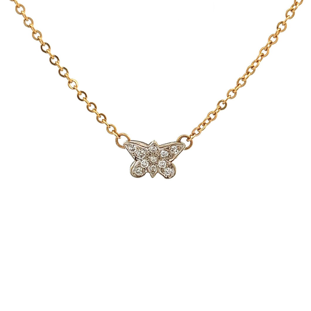 This dainty 14k yellow gold diamond necklace features 11 pave-set d...