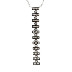 This 14k white gold Reese Brooklyn necklace features round brillian...